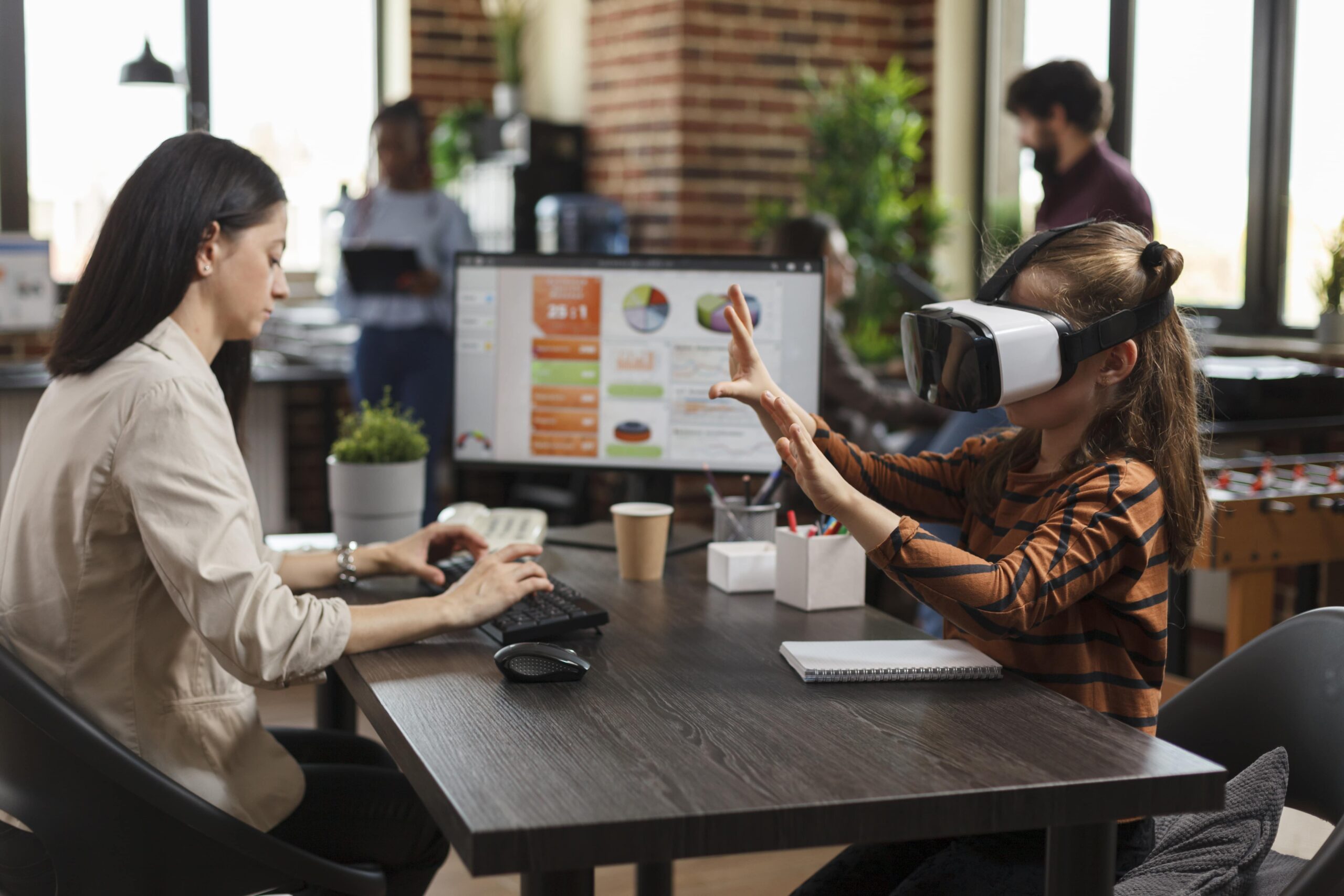 girl-wearing-virtual-reality-simulator-office-min-min
